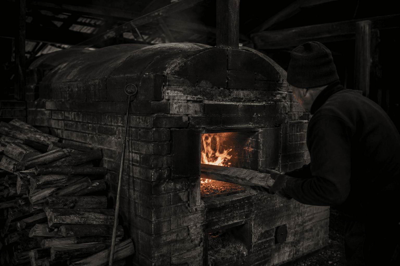 A wood kiln glowing during a long firing